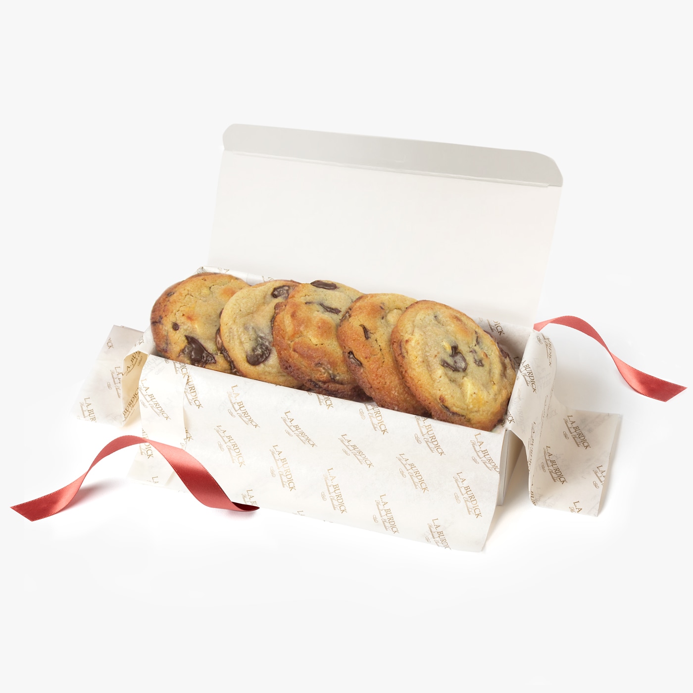 Five raspberry chocolate chip cookies packaged inside a gift box.